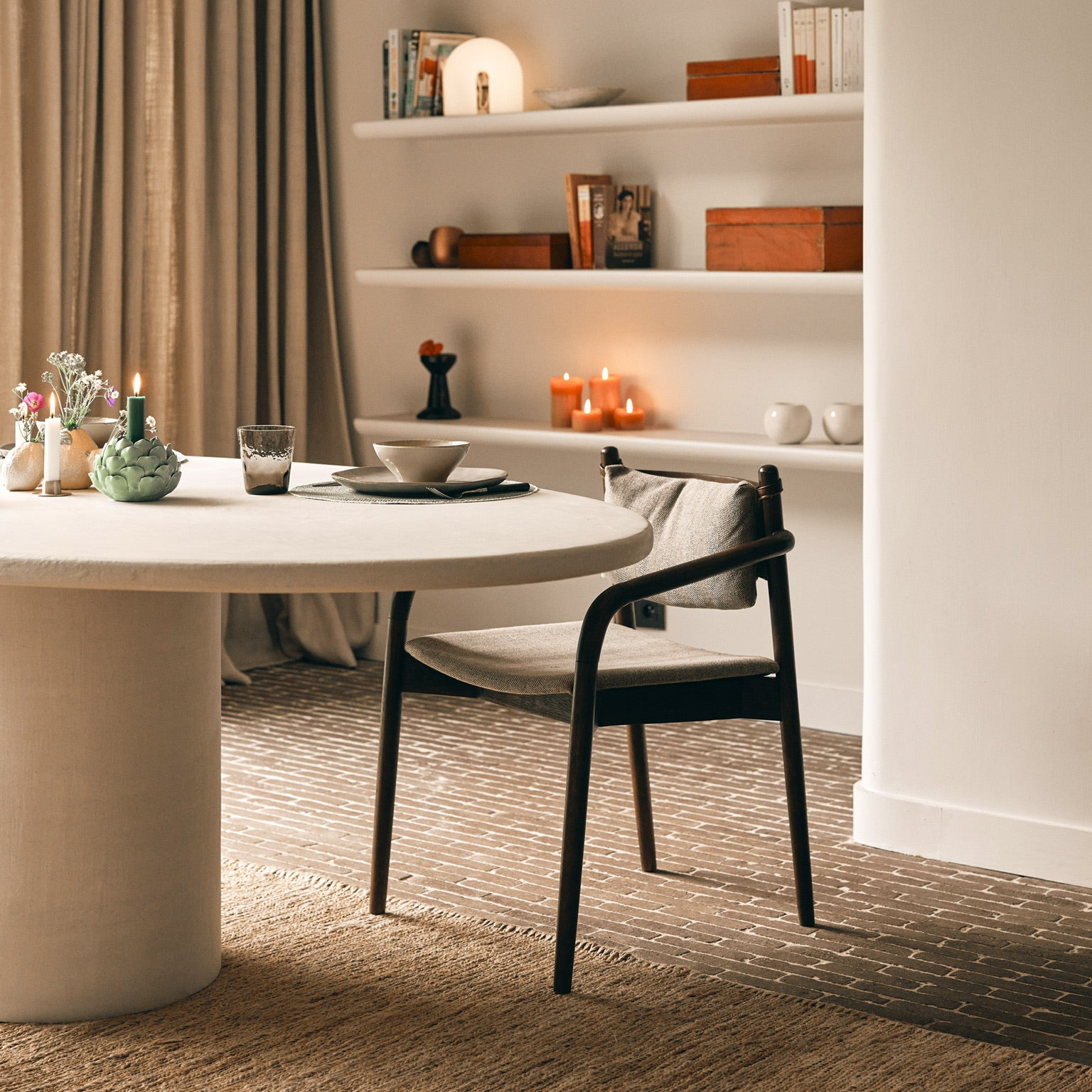 Handcrafted table with a matching chair, featuring a sleek design and high-quality materials.